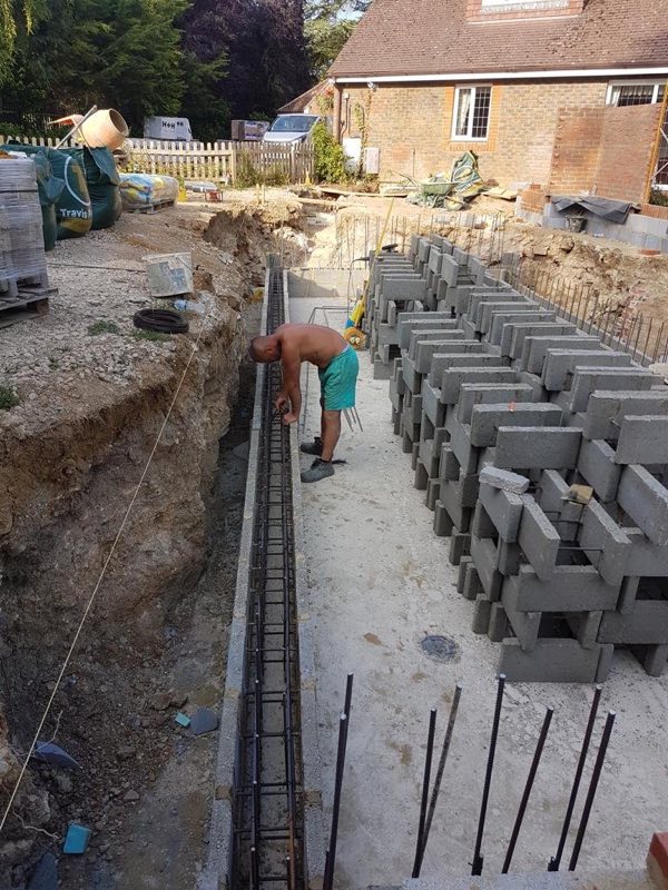 Footings and reinforcement for the pool walls, with blocks ready to lay